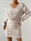 FJØRNA brushed ribbed white V-neck long-sleeved bodycon dress, close-up of fitted fabric and V-neck design.