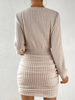 FJØRNA brushed ribbed white V-neck long-sleeved bodycon dress, close-up of fabric and fitted style