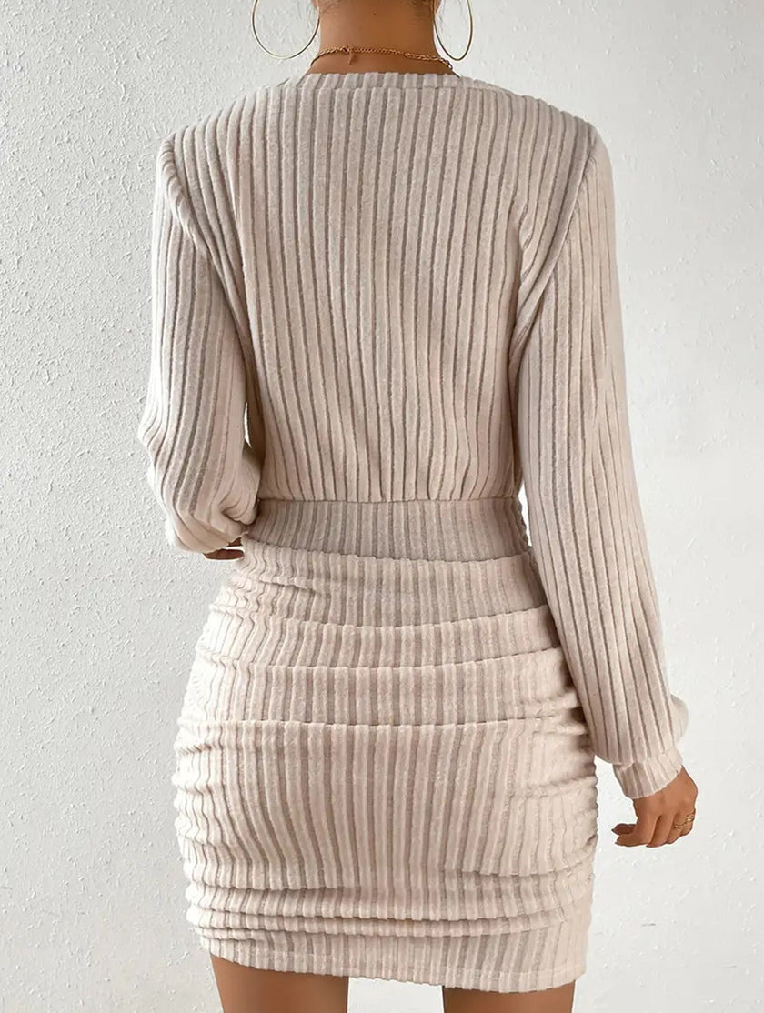 FJØRNA brushed ribbed white V-neck long-sleeved bodycon dress, close-up of fabric and fitted style