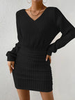 FJØRNA brushed ribbed V-neck long-sleeved bodycon dress in black, showing fitted silhouette and ribbed texture.