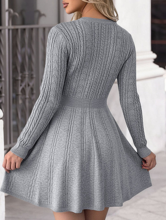 Grey textured knit fitted dress by FJØRNA, ideal for wedding guests, showcasing a close-up of the fabric and tailored fit.