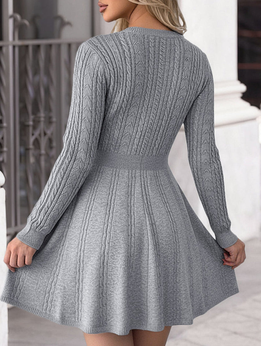 Grey textured knit fitted dress by FJØRNA, ideal for wedding guests, showcasing a close-up of the fabric and tailored fit.