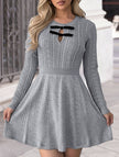 FJØRNA grey textured knit fitted dress, perfect for wedding guests, showing the soft fabric and tailored silhouette.