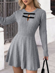 Grey textured knit fitted dress by FJØRNA, perfect for wedding guests, showcasing a stylish and comfortable silhouette.