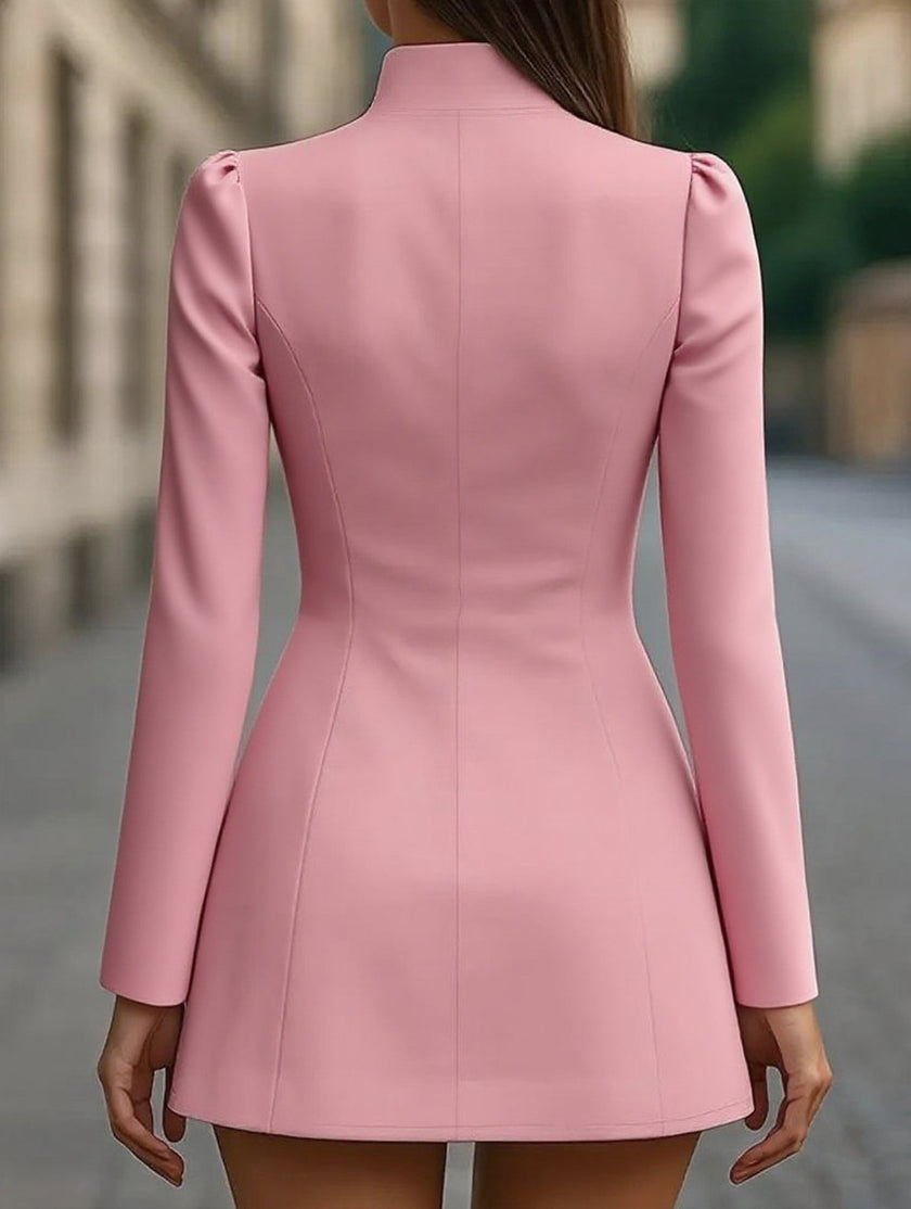 White slim-fit dress with stand-up collar and single-breasted design by FJØRNA, shown on a mannequin.
