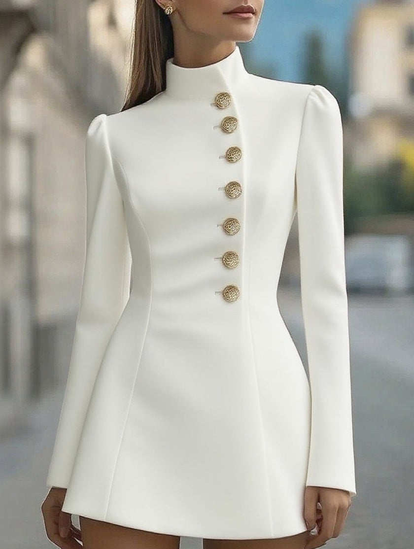 White FJØRNA slim-fit dress with stand-up collar and single-breasted design, displayed on a hanger.