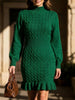 FJØRNA white cable knit waist-cinching sweater dress, stylish and cozy, shown on a model with a fitted silhouette.