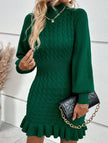Green cable knit waist-cinching sweater dress by FJØRNA, featuring a fitted silhouette and cozy knit texture.