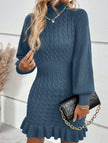 Navy cable knit waist-cinching sweater dress by FJØRNA, featuring a fitted silhouette and cozy knit texture.
