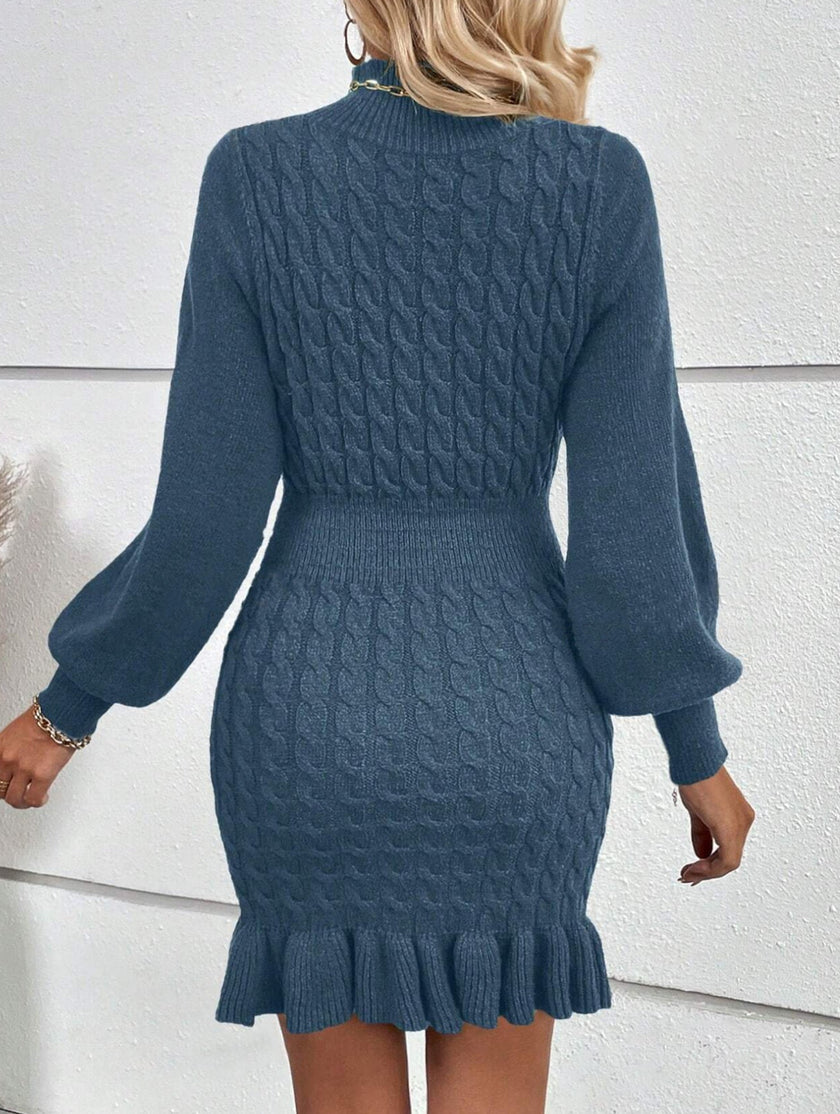 Navy cable knit waist-cinching sweater dress by FJØRNA, stylish and fitted with a cozy textured pattern and long sleeves.
