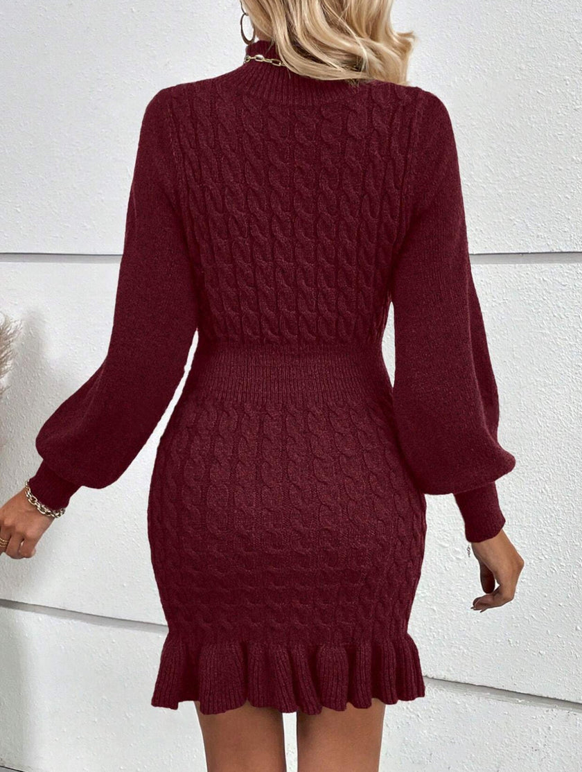 White cable knit waist-cinching sweater dress by FJØRNA, featuring a stylish fit and cozy texture, perfect for casual or dressy occasions.