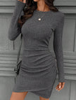 FJØRNA white knitted slim-fit long-sleeved dress, stylish and form-fitting, displayed on a mannequin.