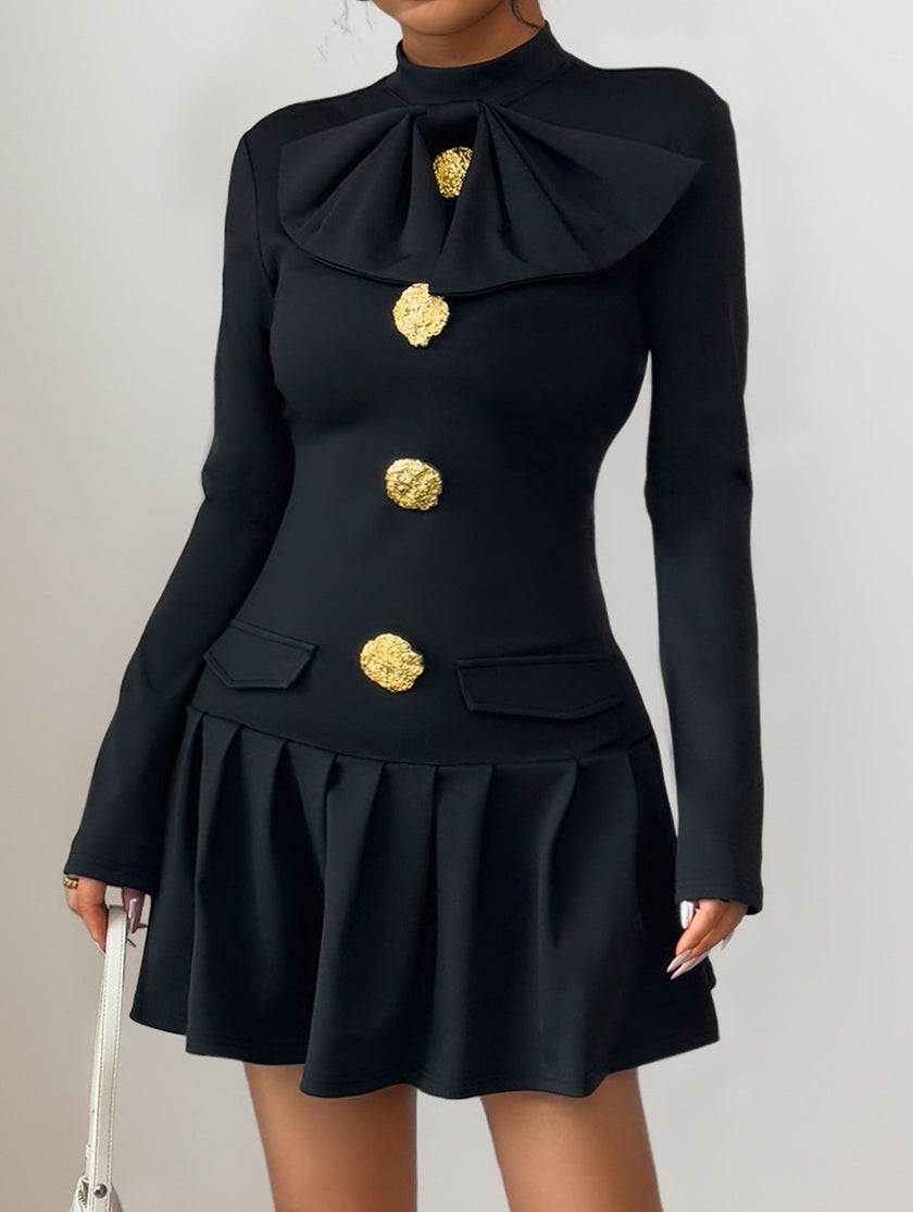 Black high-neck bow button dress by FJØRNA, featuring a stylish design with a fitted silhouette and elegant details.