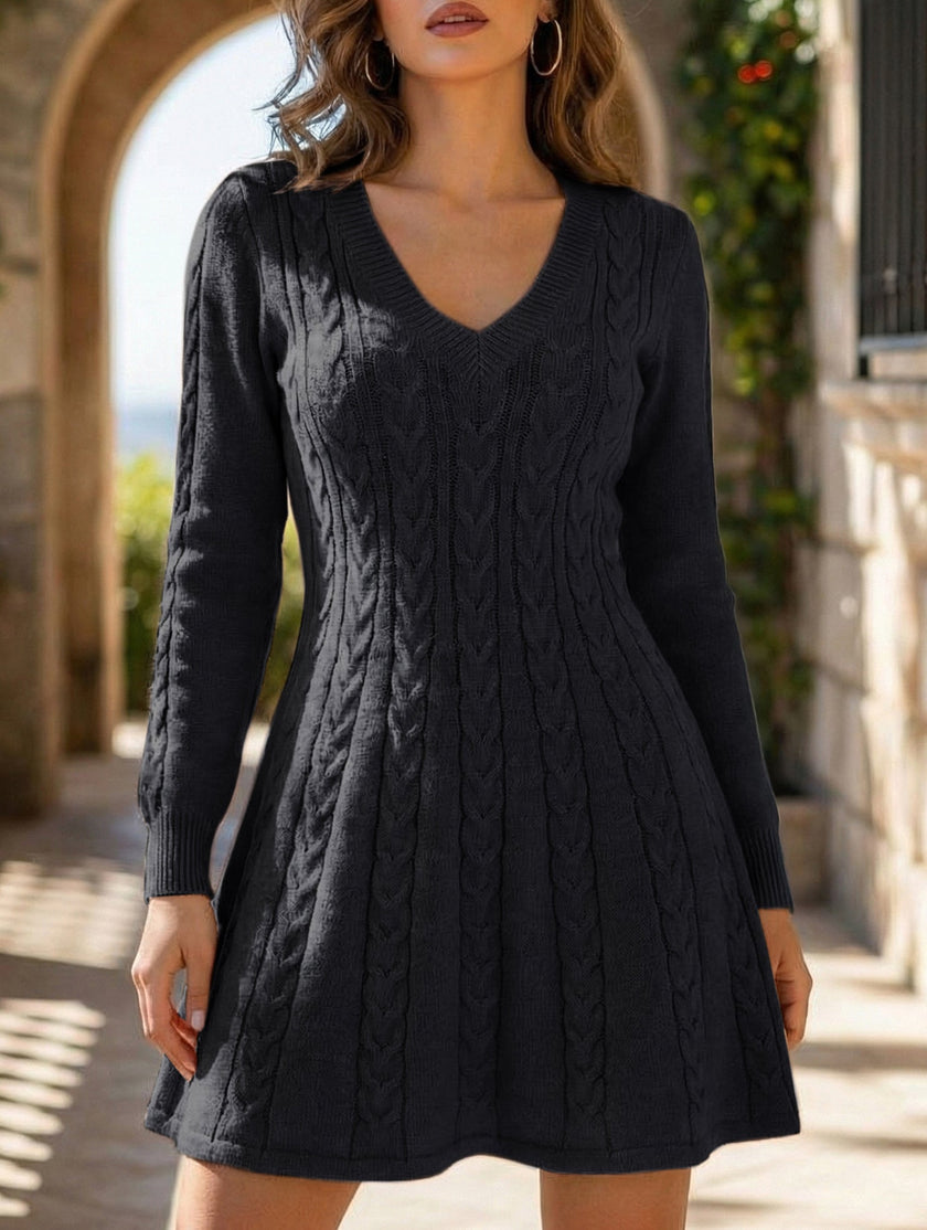 FJØRNA white retro cable knit V-neck fitted dress, showcasing a close-up of the textured knit fabric and V-neck design.
