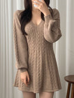 FJØRNA retro cable knit V-neck fitted dress in white, featuring a classic cable pattern and a tailored silhouette.