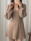 FJØRNA retro cable knit V-neck fitted dress in white, showcasing its textured knit fabric and classic silhouette.