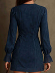 White long-sleeved zippered lace midi dress by FJØRNA, featuring a fitted silhouette and elegant design.