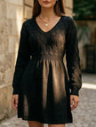 Black crochet V-neck A-line beach dress by FJØRNA, featuring a stylish, lightweight design perfect for summer outings.