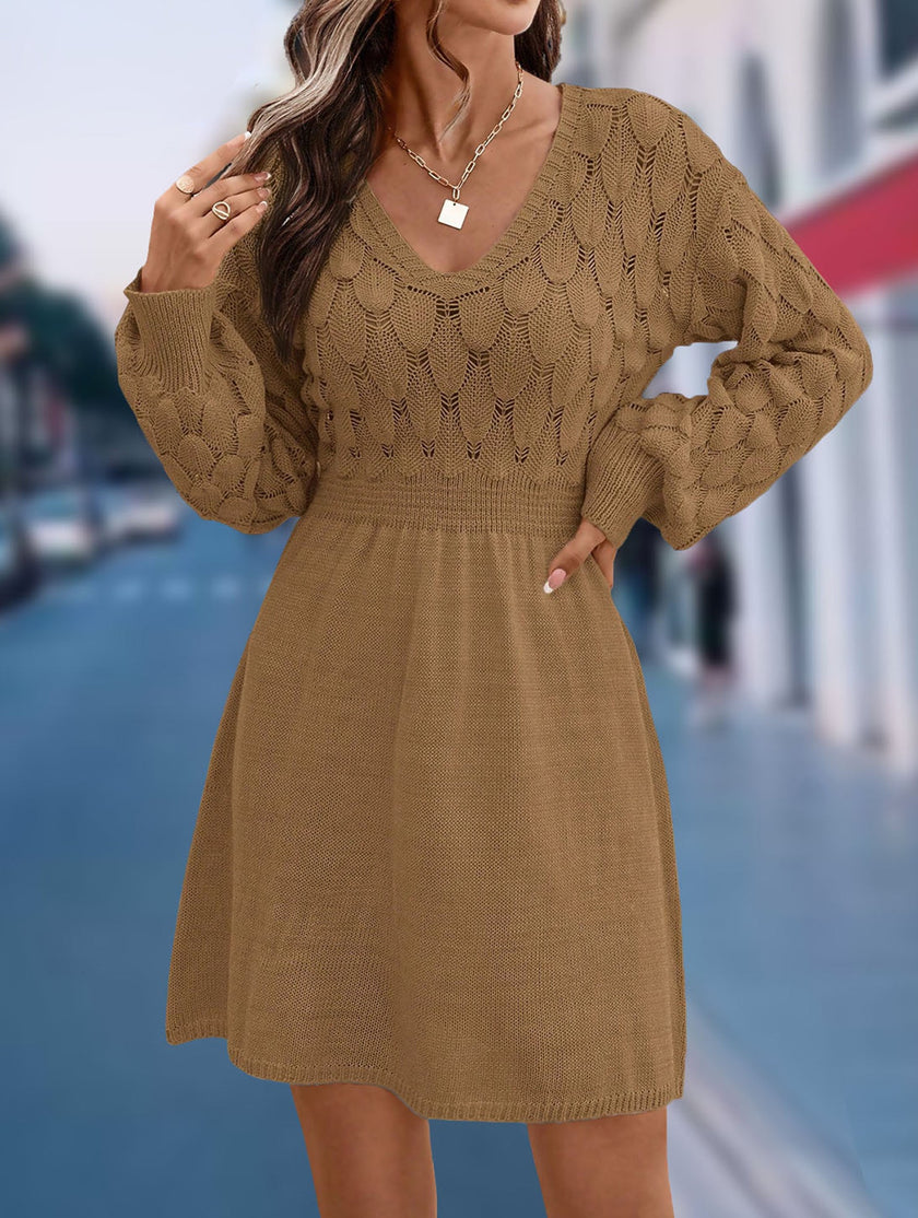 White crochet V-neck A-line beach dress by FJØRNA with a relaxed fit, perfect for casual summer wear.