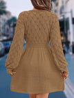 White crochet V-neck A-line beach dress by FJØRNA, featuring a relaxed fit and intricate crochet details.