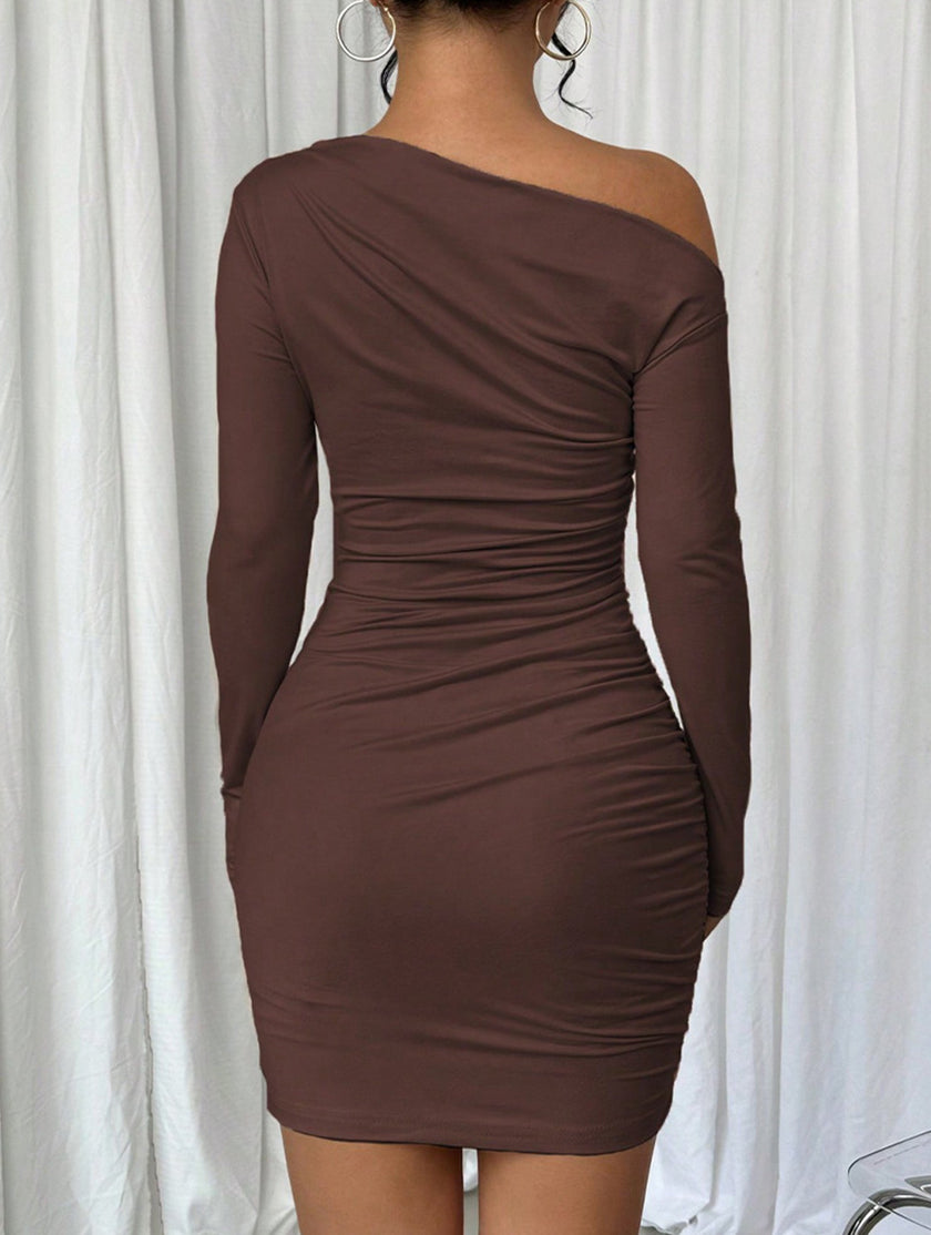 FJØRNA one shoulder long sleeve white bodycon dress, stylish and fitted, shown on a model with a sleek design and elegant silhouette.