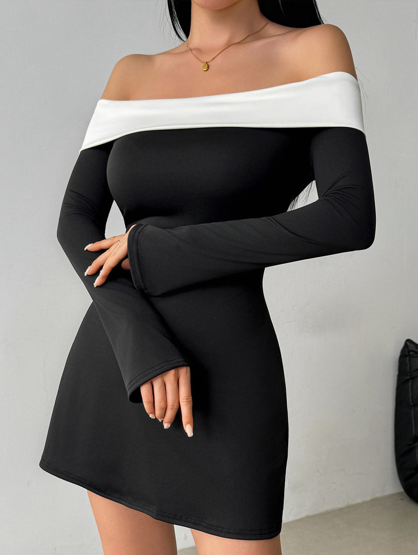 FJØRNA white off-shoulder dress with bell sleeves, stylish and elegant, shown on a model against a neutral background.