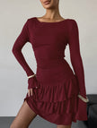 White waist cinched ruffle long sleeve work dress by FJØRNA, featuring a fitted silhouette and elegant ruffle details.