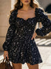FJØRNA floral print fitted waist dress for women, elegant black dress with vibrant floral pattern, sleeveless design.
