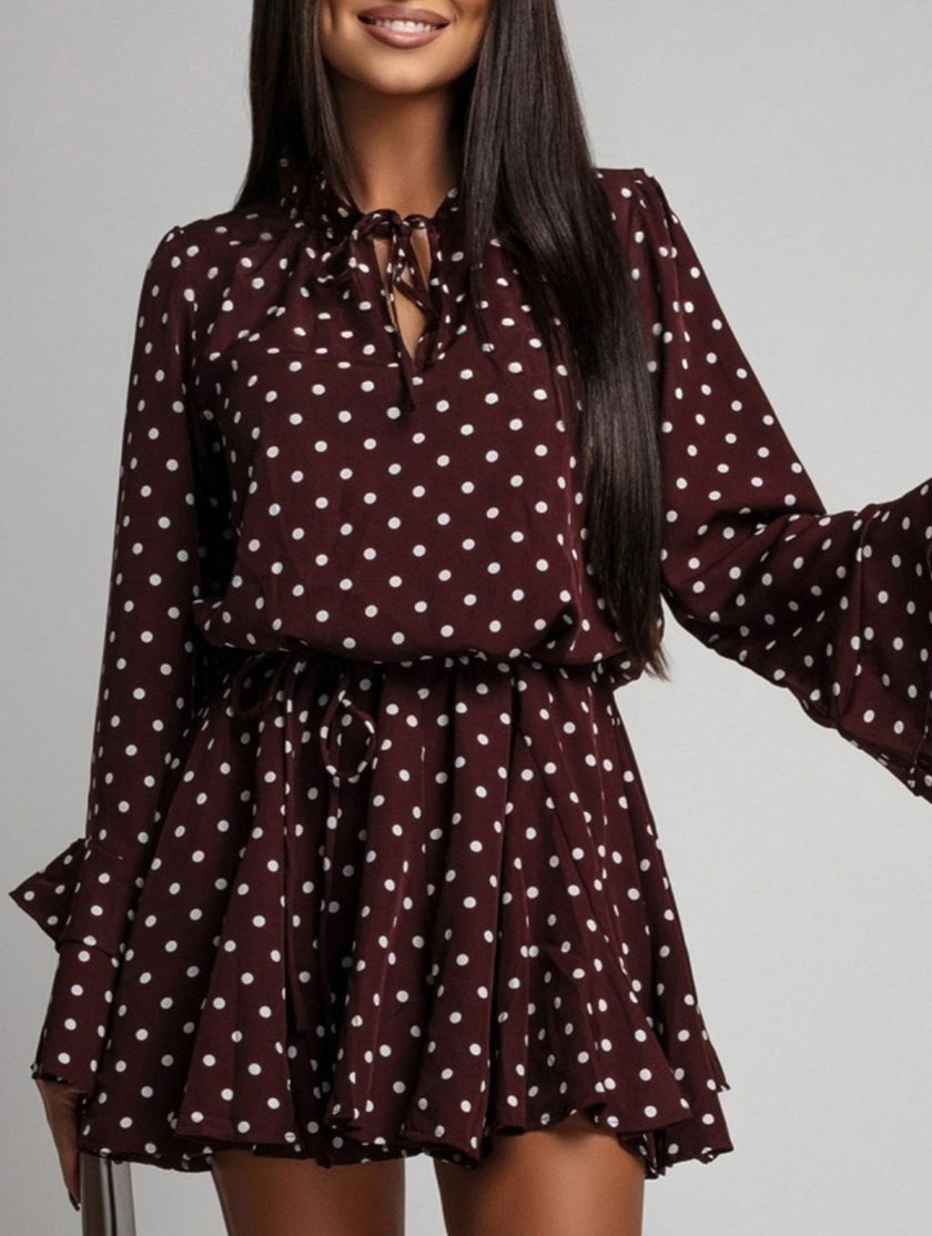 FJØRNA polka dot white V-neck long sleeve midi dress with dark brown polka dot pattern, stylish and elegant for casual or formal wear.