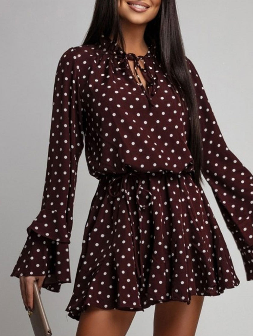 Dark brown polka dot V-neck long sleeve midi dress by FJØRNA, featuring a stylish design and classic midi length.