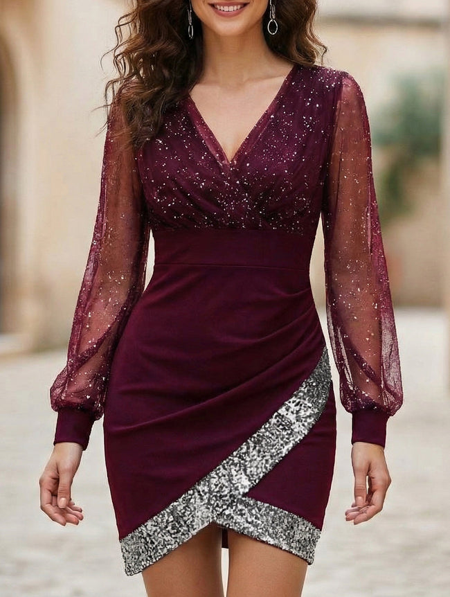 Women's white mesh sequin patchwork dress by FJØRNA, featuring shimmering sequins and a stylish patchwork design.