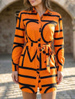 Orange floral long-sleeved casual shirt dress for women by FJØRNA, perfect for casual wear or wedding occasions.