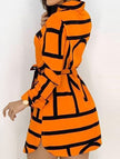 Orange floral long-sleeved casual shirt dress for women by FJØRNA, perfect for casual wear or weddings.