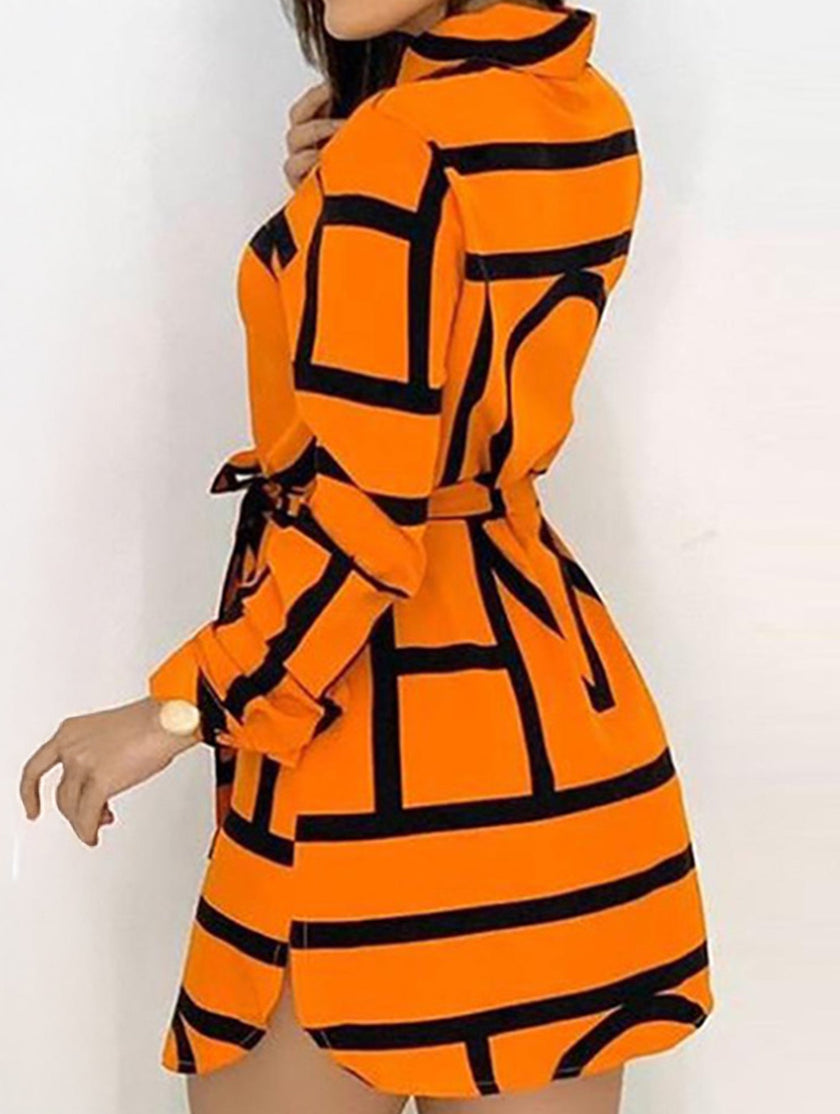 Orange floral long-sleeved casual shirt dress for women by FJØRNA, perfect for casual wear or weddings.