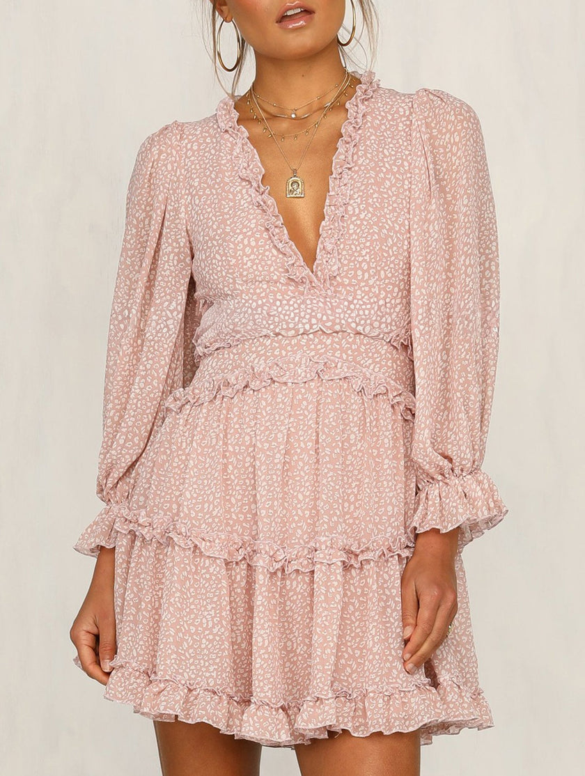 FJØRNA white V-neck fitted waist puff sleeve chiffon dress displayed on a hanger, showcasing elegant design and lightweight fabric.