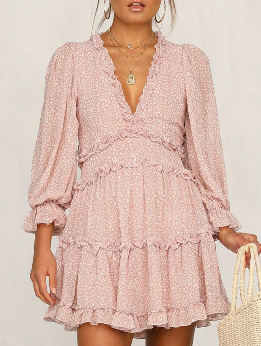 White V-neck fitted waist puff sleeve chiffon dress by FJØRNA, showcasing elegant design and flowy fabric.