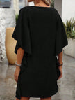 Black FJØRNA solid loose ruffle V-neck flowy dress with lightweight fabric and feminine design, perfect for casual or semi-formal wear.