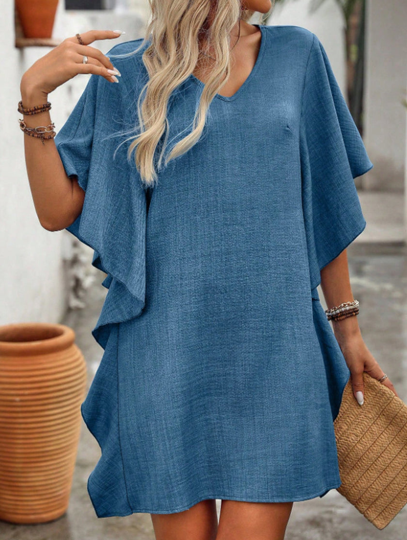 Blue FJØRNA solid loose ruffle V-neck flowy dress with a relaxed fit and feminine detailing, ideal for casual or summer wear.