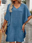 Blue FJØRNA solid loose ruffle V-neck flowy dress with lightweight fabric and feminine design, perfect for casual or special occasions.