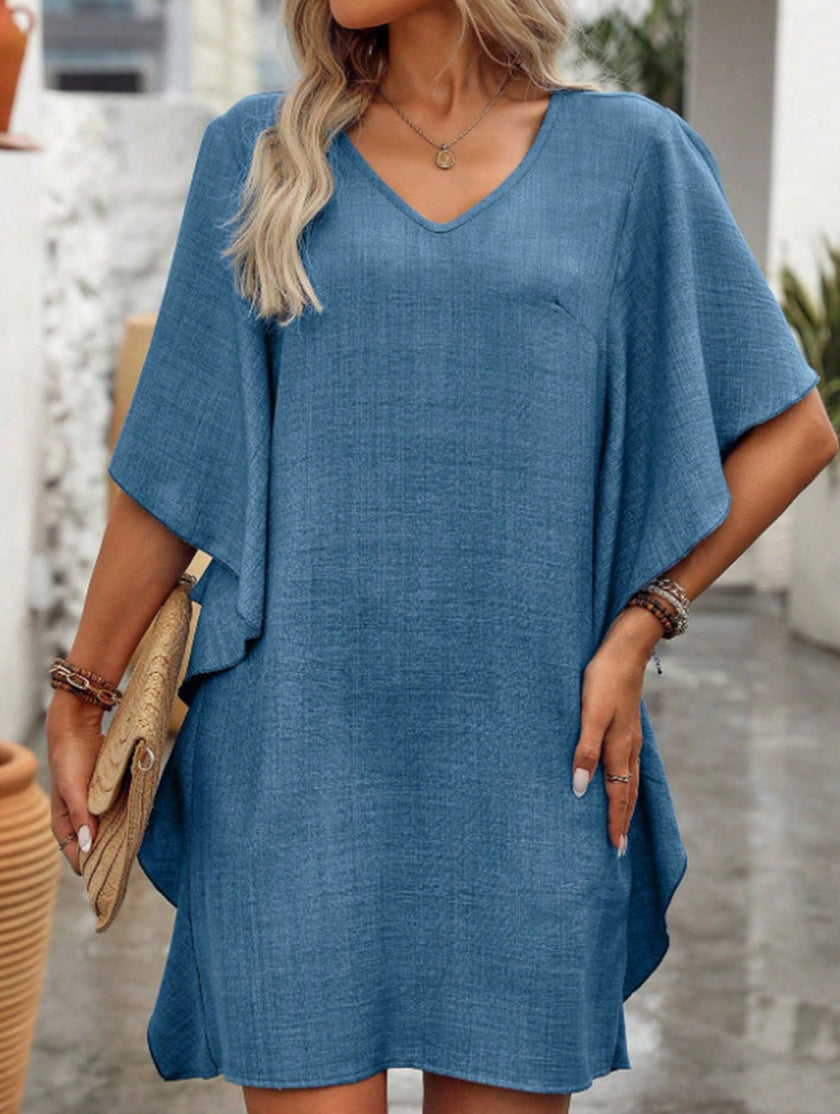 Blue FJØRNA solid loose ruffle V-neck flowy dress with lightweight fabric and feminine design, perfect for casual or special occasions.