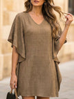 White FJØRNA solid loose ruffle V-neck flowy dress with a relaxed fit and feminine ruffle details, perfect for casual or special occasions.