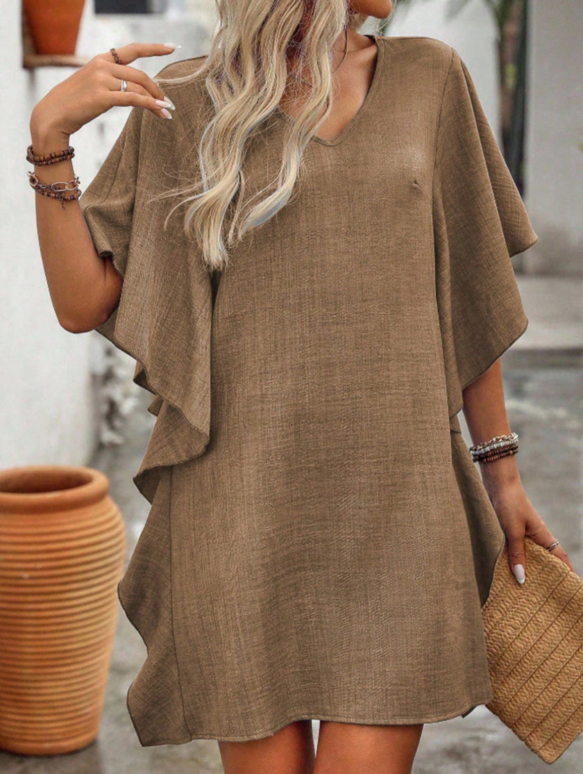 White FJØRNA solid loose ruffle V-neck flowy dress with a relaxed fit and feminine ruffle details, perfect for casual or elegant occasions.