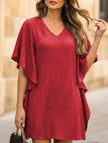 White FJØRNA solid loose ruffle V-neck flowy dress, featuring a relaxed fit and elegant ruffle details.