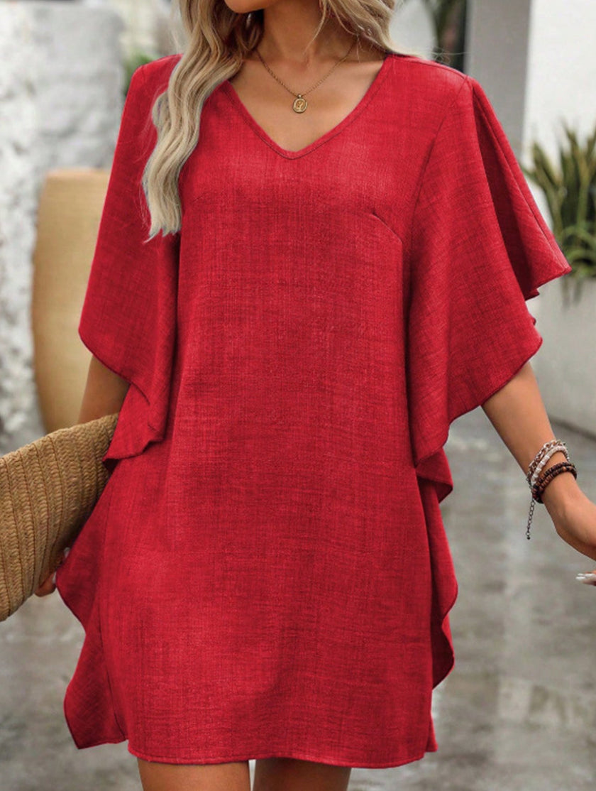 White FJØRNA solid loose ruffle V-neck flowy dress with lightweight fabric and feminine design, perfect for casual or summer wear.