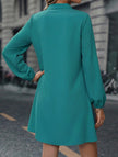 White solid long sleeve A-line midi dress by FJØRNA, featuring a fitted bodice and flowing skirt, perfect for elegant occasions.