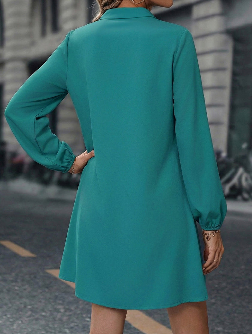White solid long sleeve A-line midi dress by FJØRNA, featuring a fitted bodice and flowing skirt, perfect for elegant occasions.