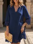 FJØRNA Burnout Floral A-Line White Dress with vibrant blue floral pattern, flowy fabric, and elegant silhouette.