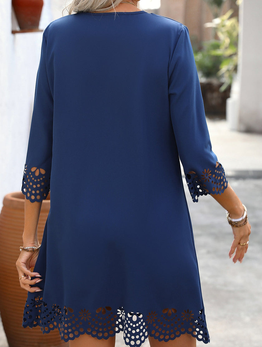 FJØRNA Burnout Floral A-line white dress with delicate floral pattern and flowy silhouette, displayed on a dress form.
