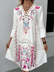 White V neck lace patch print dress by FJØRNA featuring a stylish design and elegant fabric, perfect for casual or semi-formal wear.