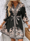 FJØRNA white tie waist print midi dress with black pattern, sleeveless design, and flowy fabric for a stylish summer look